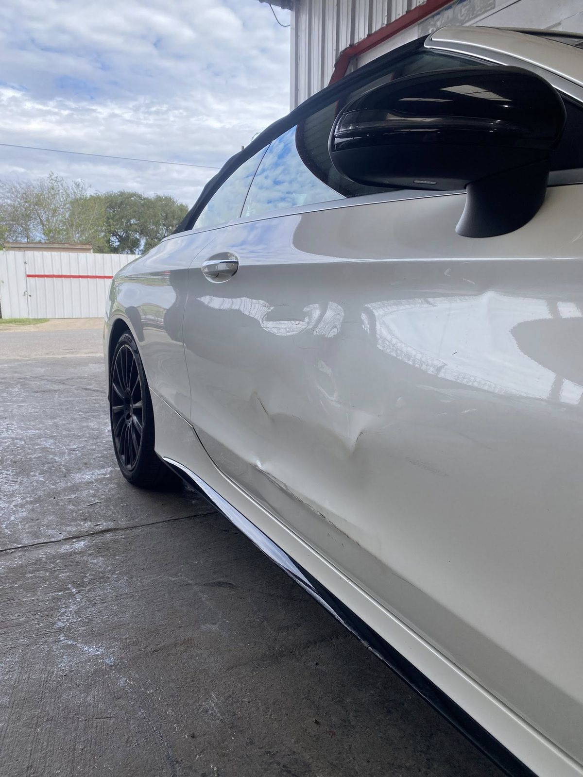 Before - Door Panel Dent Repair