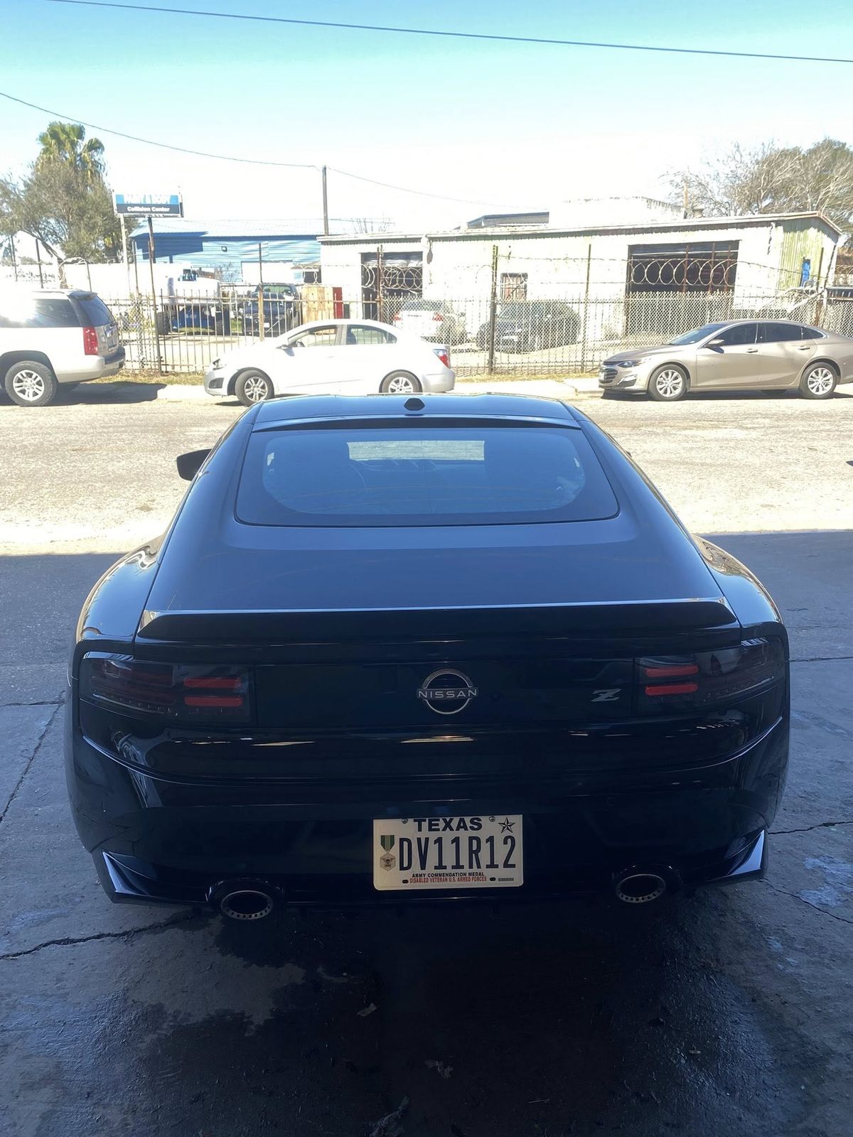 After - Nissan Z Factory Spoiler Installation with Paint Touch-Up
