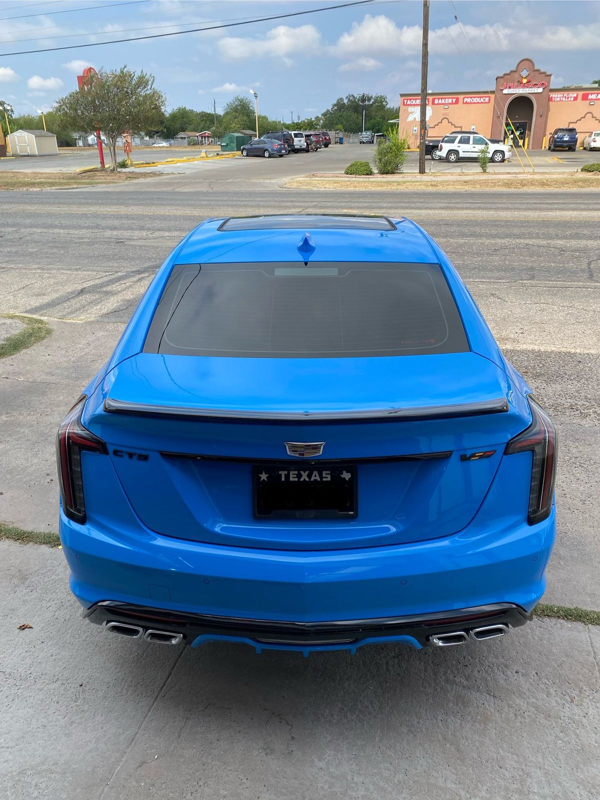 After - CT5 V Spoiler Painted Black